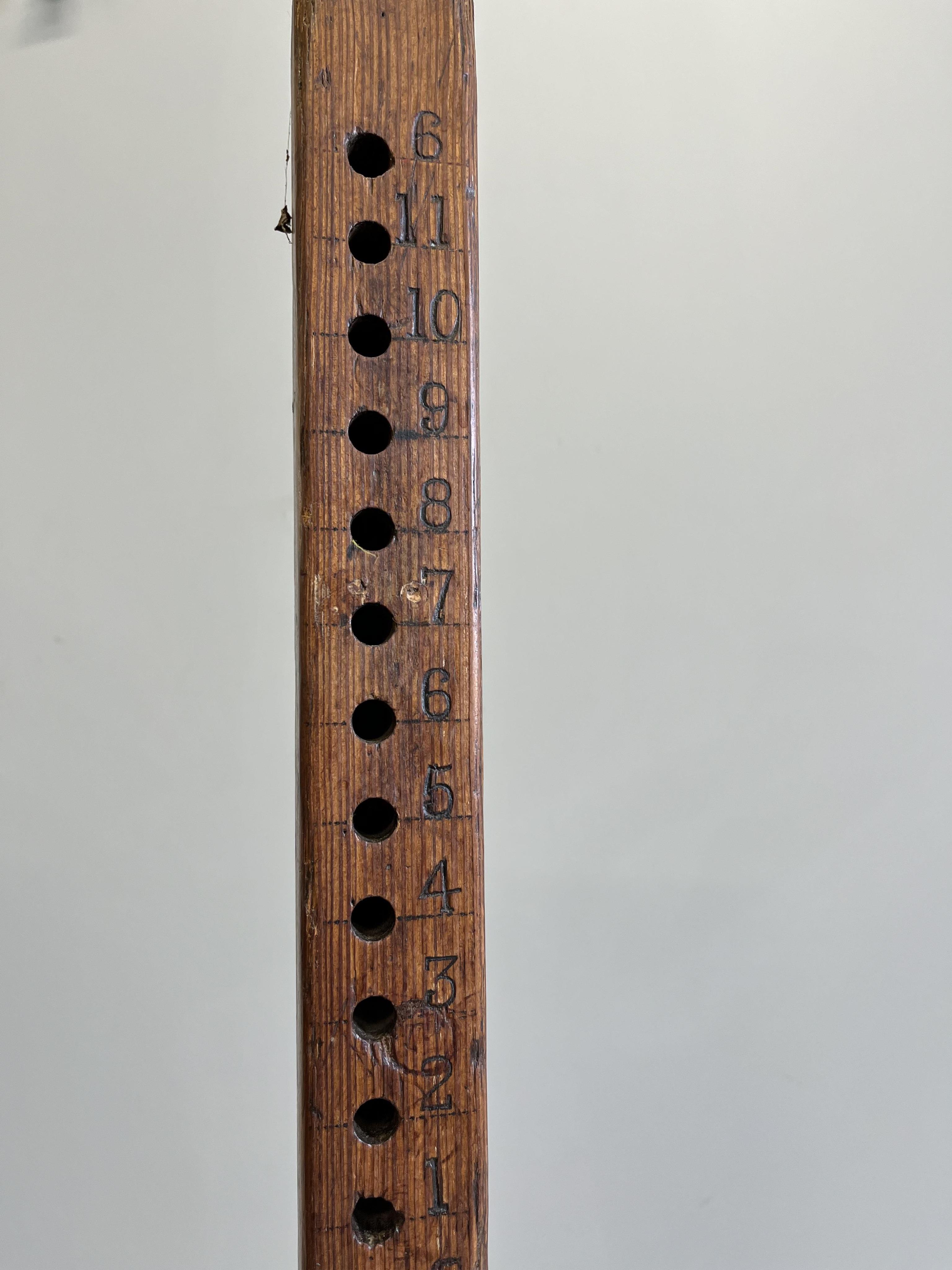 A wooden height measure, height 184cm